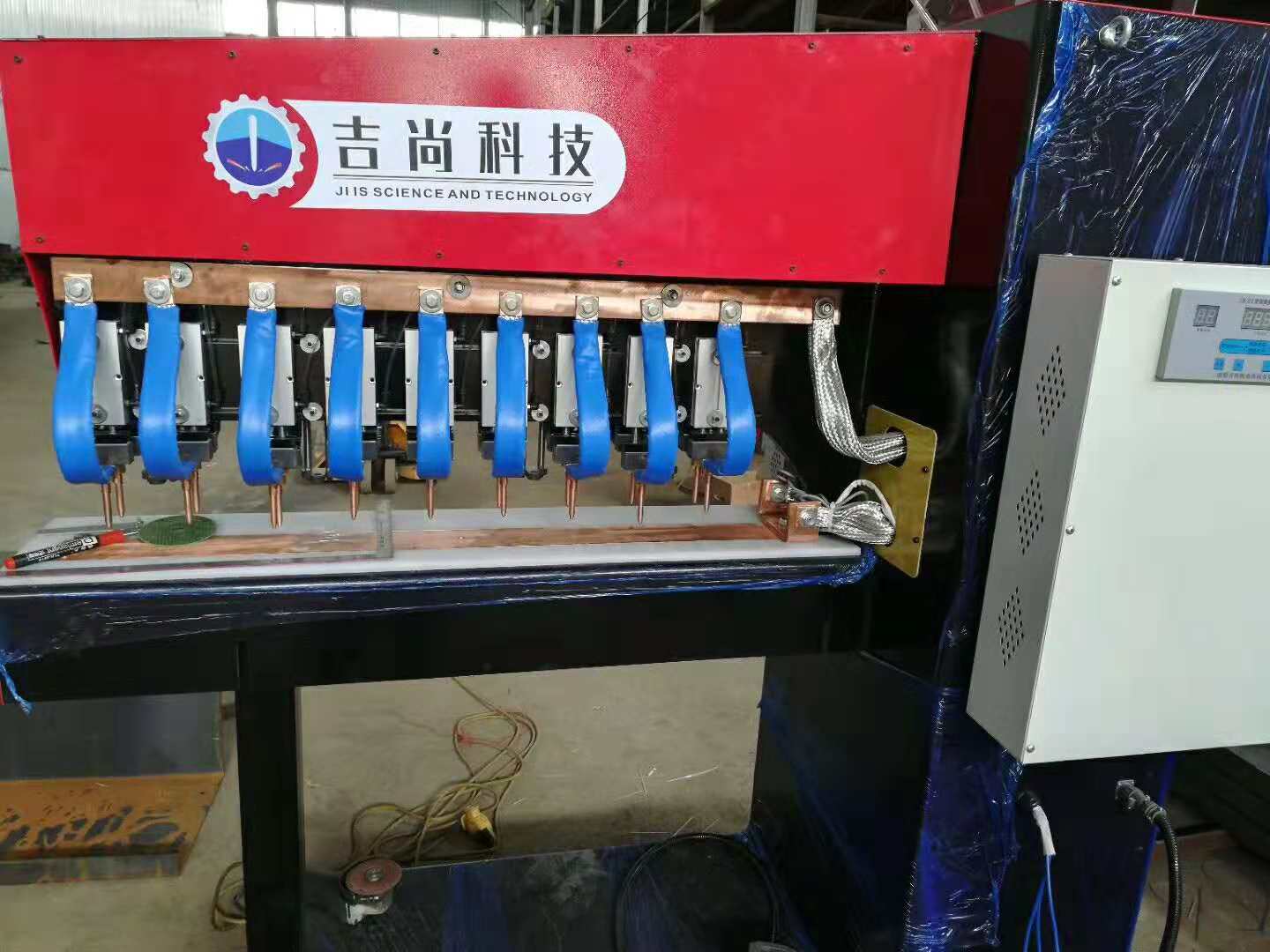 广东区总复购第四台—吉尚18头排焊机(图文)